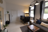 Wohnzimmer - Renovierte Oberwohnung mit Balkon in alter Stadtvilla von Emden