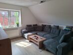 Oberwohnung mit toller Ausstattung im Zentrum von Moormerland-Warsingsfehn! - Wohnzimmer