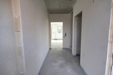 Neubau Doppelhaushälfte in ruhiger Sackgassenlage in Warsingsfehn - Flur EG (42804)