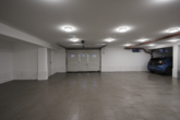 Tiefgarage - Exklusive Wohnlage – 3-Zimmerwohnung in einer Villa im 1. Obergeschoss mit Tiefgaragen-Stellplatz