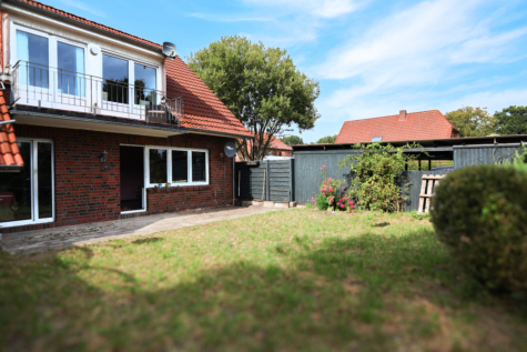 Kapitalanleger aufgepasst – vermietete Erdgeschosswohnung in einem 4-Familienhaus in Aurich-Walle! - Gartenansicht (35080)