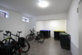 Charmante 2-Zimmerwohnung in einer Neubau-Villa mit Tiefgarage in zentraler Lage von Aurich - Müll-/Fahrradraum
