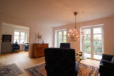 Charmante 2-Zimmerwohnung in einer Neubau-Villa mit Tiefgarage in zentraler Lage von Aurich - Wohnbereich
