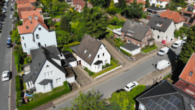 Vogelperspektive - Einfamilienhaus mit Entwicklungspotential in begehrter Wohnlage!