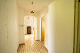 Flur EG - Einfamilienhaus mit Entwicklungspotential in begehrter Wohnlage!