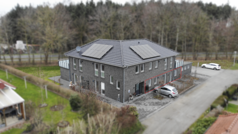 Neuwertige 2-Zimmer Erdgeschosswohnung mit Terrasse und Garten - Außenansicht (42184)