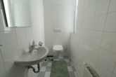 Gäste-WC - Lichtdurchflutete, barrierearme Wohnung im Stadtzentrum von Aurich!
