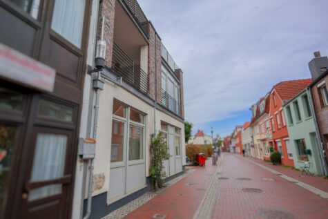 Lichtdurchflutete, barrierearme Wohnung im Stadtzentrum von Aurich! - Außenansicht (34114)