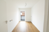 Kinderzimmer - Stilvolle 3-Zimmer-Wohnung im Neubau, 1. OG – Aufzug, Balkon & Ortskernlage