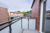 Balkon - Stilvolle 3-Zimmer-Wohnung im Neubau, 1. OG – Aufzug, Balkon & Ortskernlage
