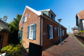 Gebäudeansicht - Hafenseite - Besondere Lage am Kutterhafen – Ferienhaus mit Hafen- und Weitblick über das Weltnaturerbe Wattenmeer