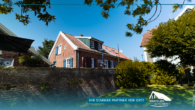 Titelbild - Ansicht Hafenseite - Besondere Lage am Kutterhafen – Ferienhaus mit Hafen- und Weitblick über das Weltnaturerbe Wattenmeer