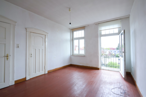 Zahlreiche Nutzungsmöglichkeiten – Wohn- und/oder Gewerbeobjekt in stadtnaher Wohnlage von Aurich! - Zimmer 1. OG (34819)