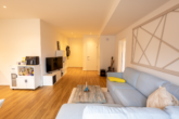 Wohnzimmer - Moderne 2-Zimmerwohnung mit Balkon direkt am Auricher Marktplatz!