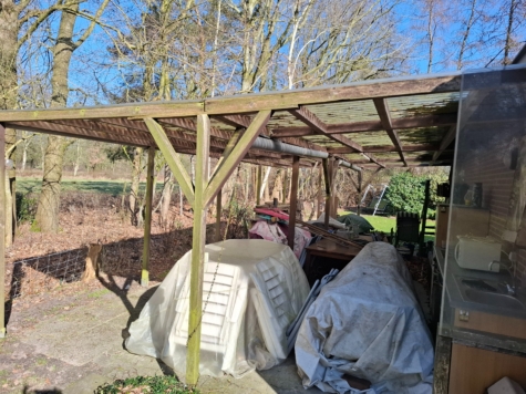 Naturliebhaber aufgepasst! Charmantes Einfamilienhaus in idyllischer Lage von Jheringsfehn - überdachter Außenbereich (34600)