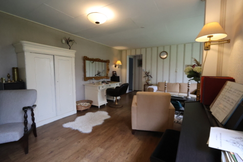 Naturliebhaber aufgepasst! Charmantes Einfamilienhaus in idyllischer Lage von Jheringsfehn - Wohnzimmer (34610)