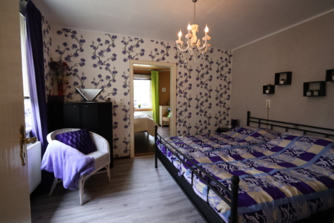 Naturliebhaber aufgepasst! Charmantes Einfamilienhaus in idyllischer Lage von Jheringsfehn - Schlafen EG II (34612)