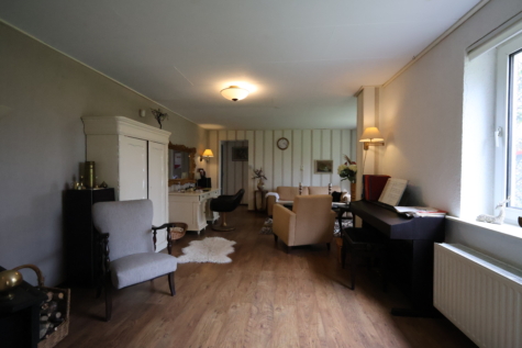 Naturliebhaber aufgepasst! Charmantes Einfamilienhaus in idyllischer Lage von Jheringsfehn - Wohnzimmer (34609)