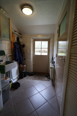 Naturliebhaber aufgepasst! Charmantes Einfamilienhaus in idyllischer Lage von Jheringsfehn - HWR mit Zugang zum Garten (34615)