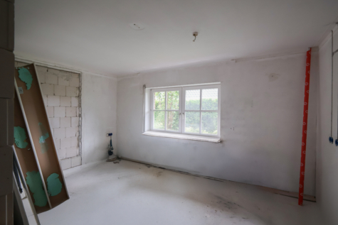 Erdgeschosswohnung mit eigenem Garten und großer Terrasse in beliebter Wohnlage von Warsingsfehn - Schlafzimmer (39881)