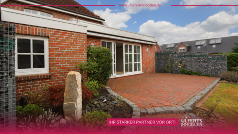 Erdgeschosswohnung mit eigenem Garten und großer Terrasse in beliebter Wohnlage von Warsingsfehn - Gartenansicht I Titelbild (39879)