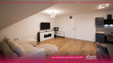 Neuwertige Dachgeschosswohnung mit Aufzug und Balkon im Zentrum von Warsingsfehn - Titel (40656)