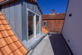 Balkon - Kernsanierte, stilvolle Maisonettewohnung für Singles in der Auricher Fußgängerzone