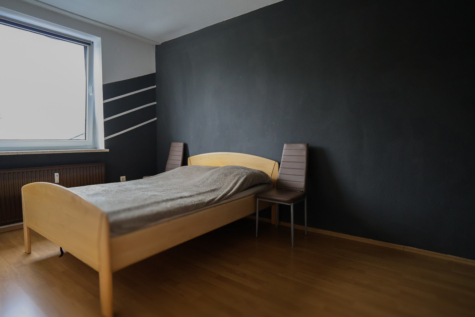 Vermietete 2 Zimmer-Wohnung in Zentrumslage von Warsingsfehn - Schlafzimmer (35187)