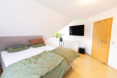 Schlafzimmer - Attraktives Einfamilienhaus in idyllischer Lage von Moormerland-Jheringsfehn