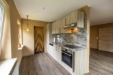 Wohnen/Essen - Top gepflegte Oberwohnung mit Terrasse und Gartenanteil in zentraler Lage von Warsingsfehn