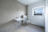 Badezimmer - Neubau Dachgeschosswohnung in bester Ortskernlage von Remels