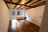 Wohnzimmer - Stadtwohnung mit Charme – Wohnen auf mehreren Ebenen!